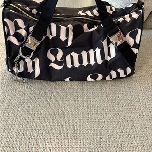 L.A.M.B. LeSportsac Gwen Stefani Black and White Barrel Bag